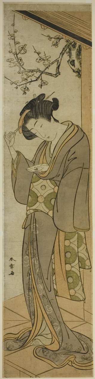 Donna su una veranda che sta per aprire una lettera da Katsukawa Shunsho