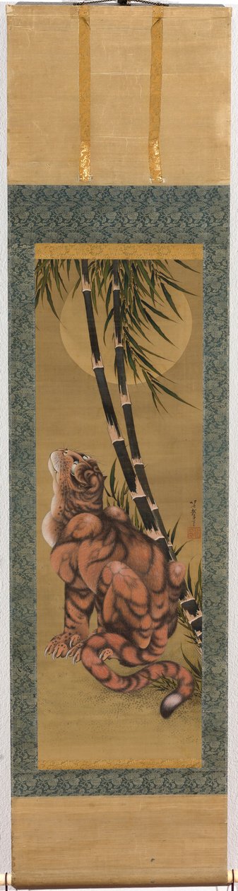 Tigre tra i bambù che guarda la luna piena da Katsushika Hokusai