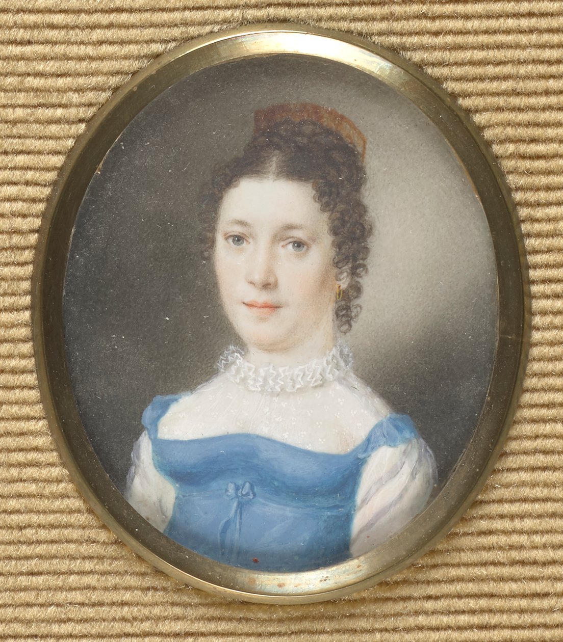 Dama in abito impero blu da Leopold Blonder
