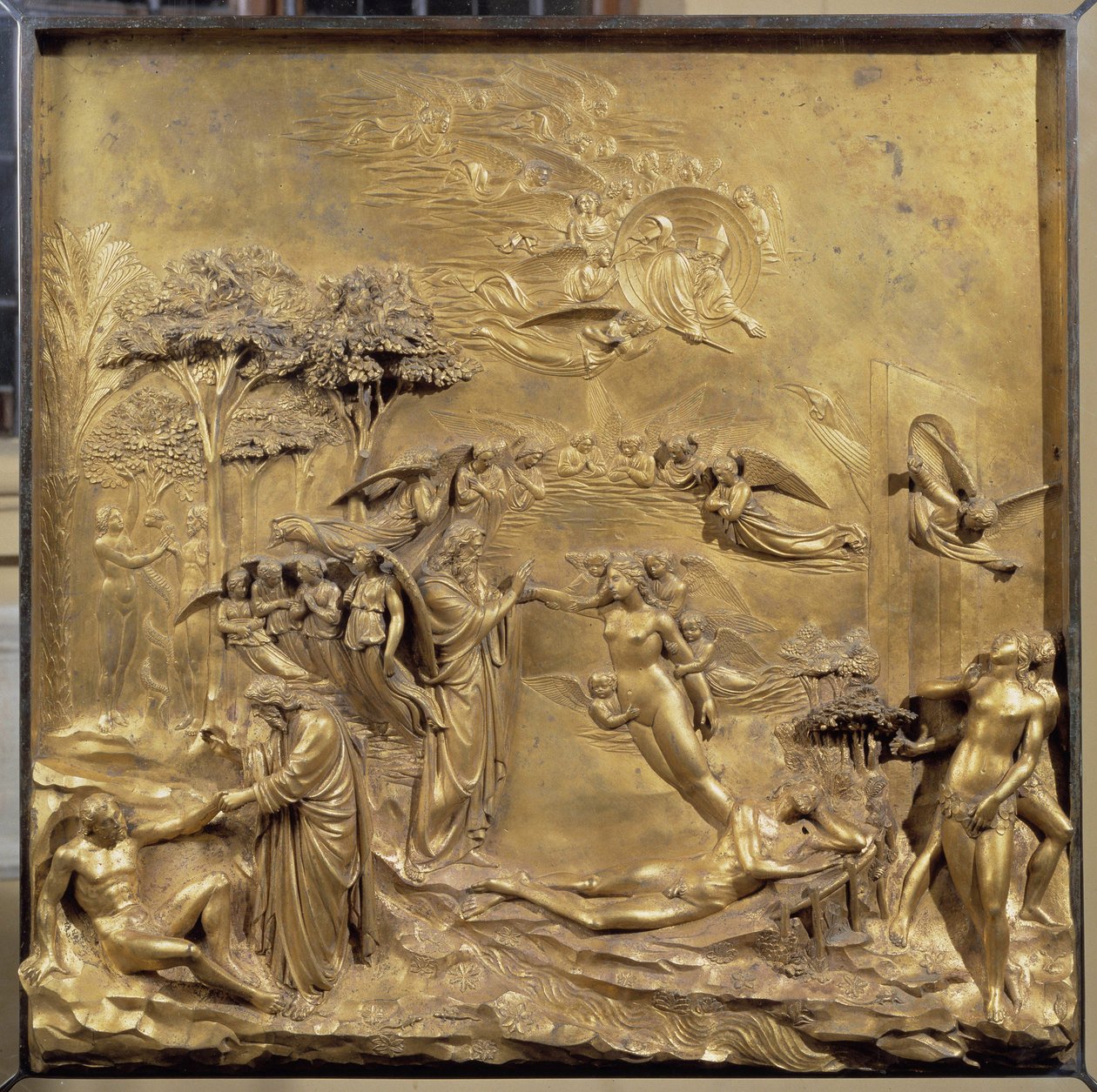 Storia della vita di Adamo: la nascita di Adamo, la creazione di Eva e Adamo ed Eva cacciati dal Paradiso. Pannello originale della porta del Paradiso da Lorenzo Ghiberti