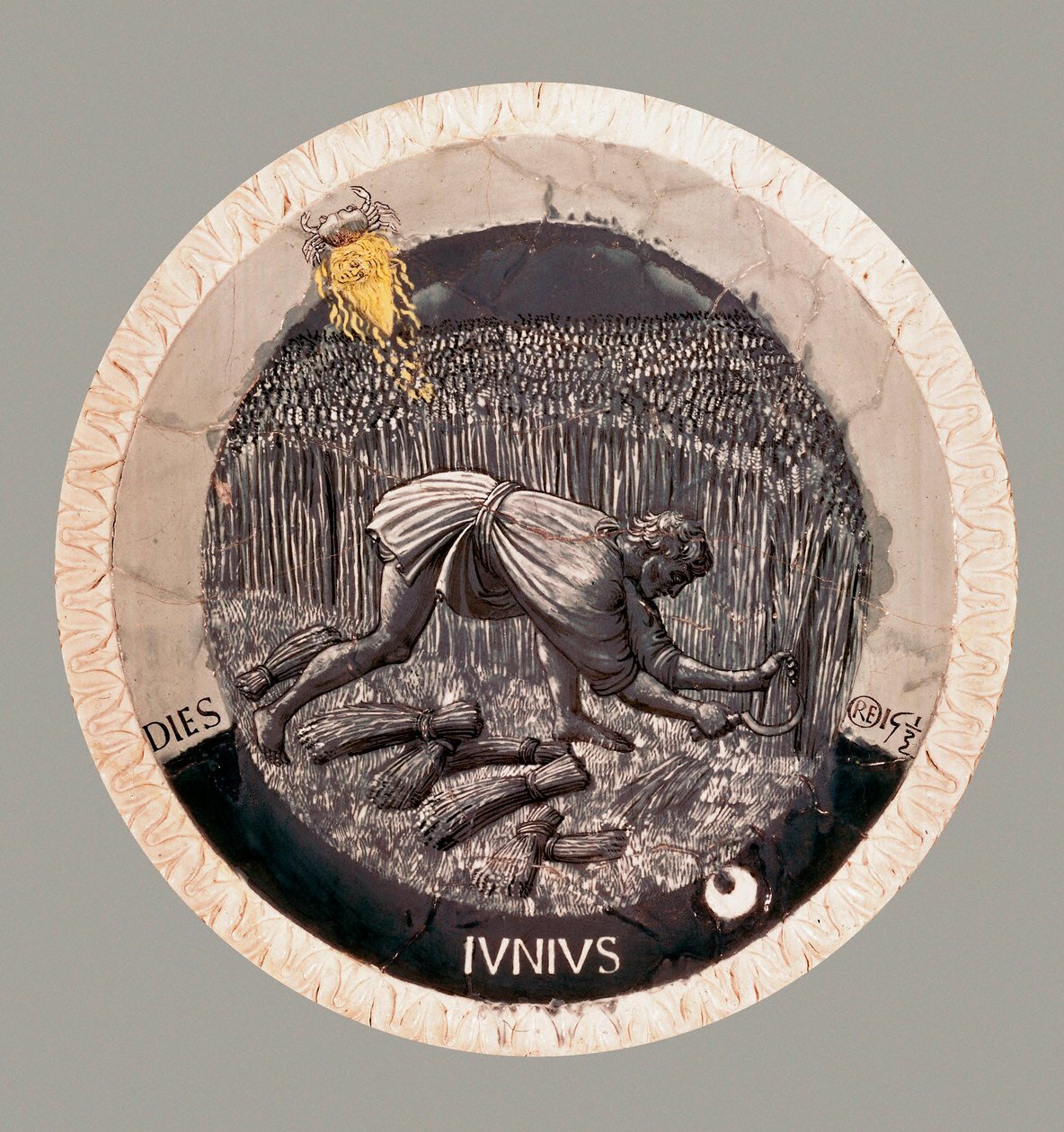 Giugno: un contadino che raccoglie il grano. Terracotta di Luca della Robbia da Luca Della Robbia