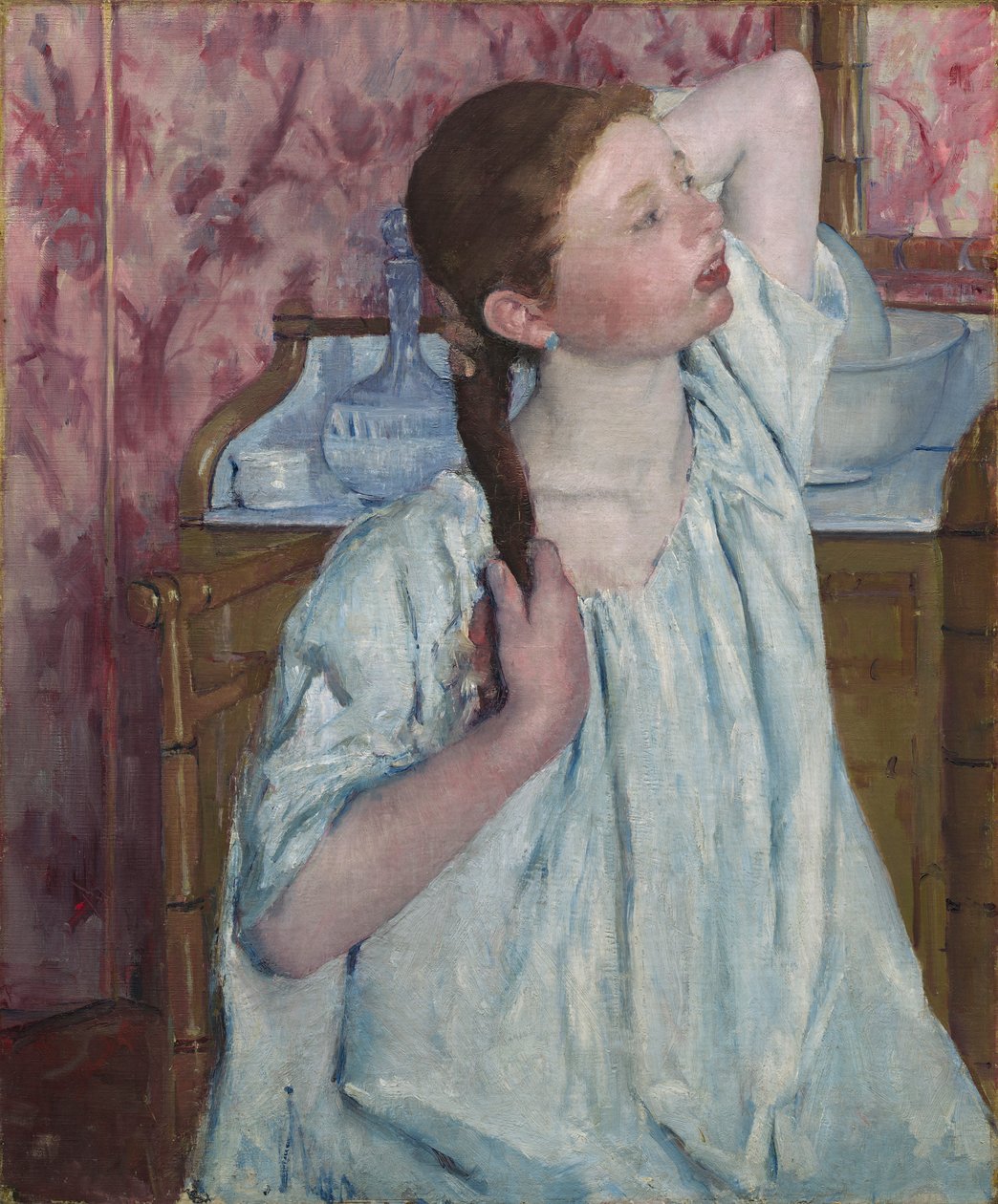 Ragazza che si sistema i capelli da Mary Stevenson Cassatt