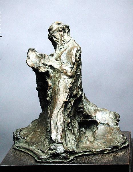 Uomo che legge da Medardo Rosso