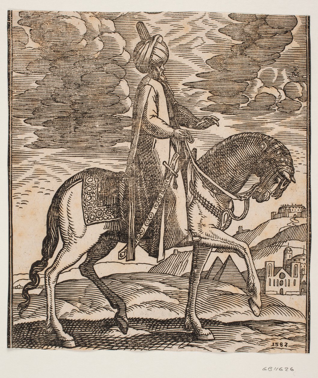 Cavaliere con turbante, con una spada al fianco destro, profilo verso destra; tra le zampe anteriori del cavallo, due piramidi in vista da Melchior Lorck