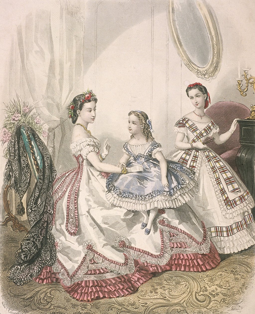 Due donne e una bambina che indossano le ultime mode da interno da Millia Lacouriere