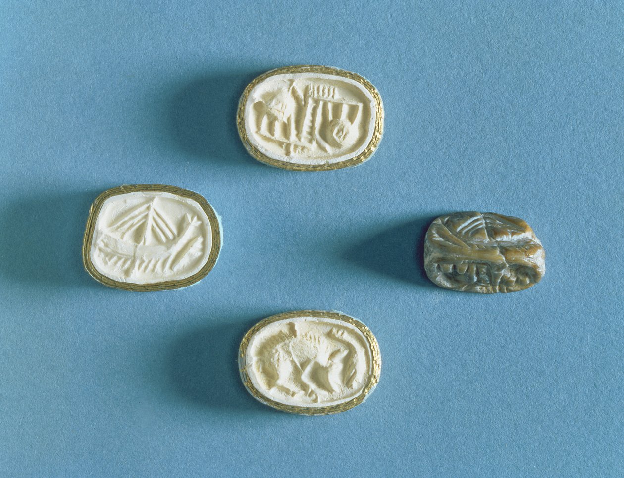 Sigillo con tre impressioni da Cnosso, primo periodo minoico da Minoan