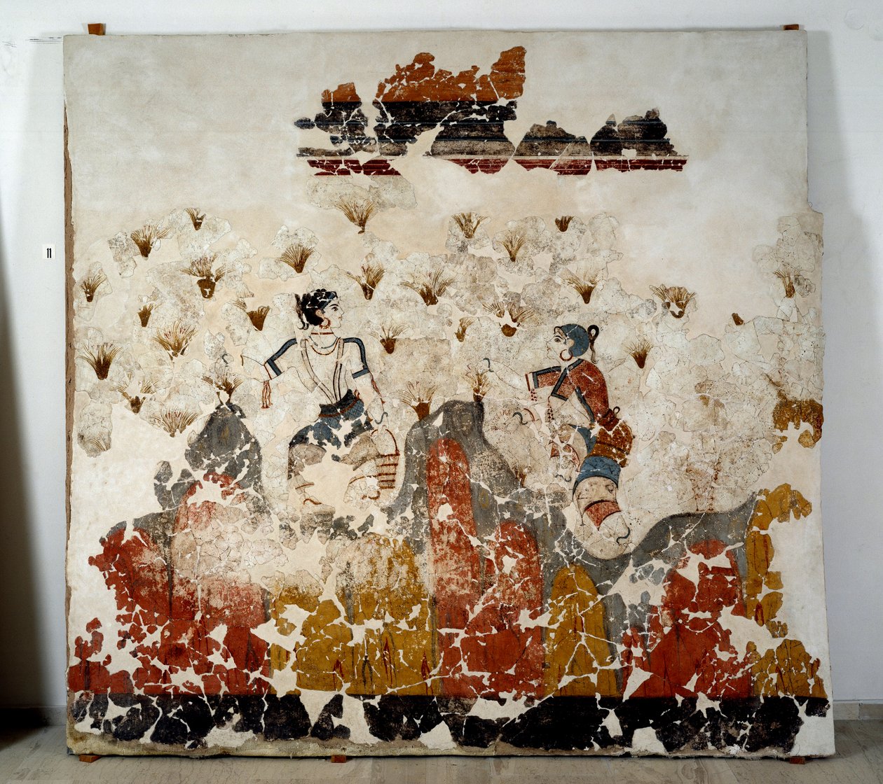 Civiltà minoica: donne che raccolgono zafferano. Affresco dal bacino lustrale di Xeste 3 ad Akrotiri (Thera), Santorini. Collezione di affreschi di Akrotiri a Thera da Minoan