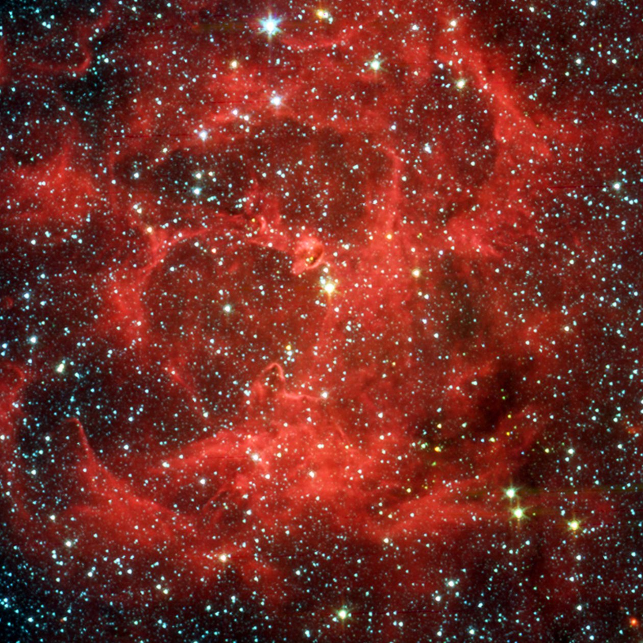 Confronto delle viste in luce visibile e infrarossa del telescopio spaziale Spitzer della nebulosa Trifida luminosa, una gigantesca nube di gas e polvere che forma stelle situata a 5.400 anni luce di distanza nel Sagittario. Credito NASA da National Aeronautics and Space Administration National Aeronautics and Space Administration