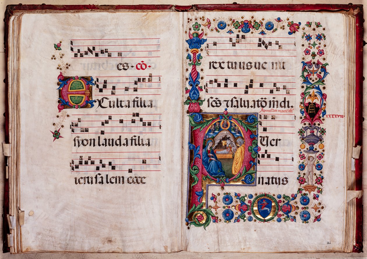 Biblioteca Piccolomini: libro del coro, cod. 102.8, ff. 47v-48r con "Natività" da Pellegrino di Mariano