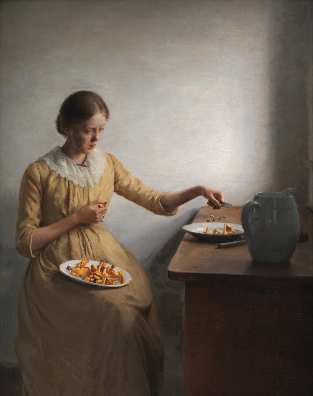 Una giovane ragazza che prepara i finferli da Peter Vilhelm Ilsted