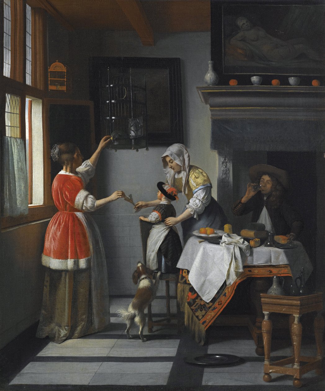 Interno con un bambino che nutre un pappagallo da Pieter de Hooch
