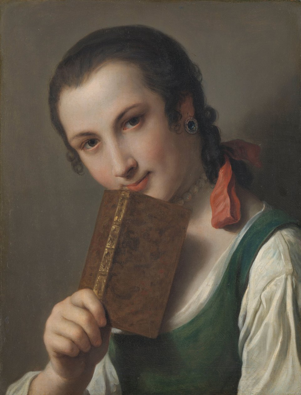 Una giovane donna con un libro da Pietro Antonio Rotari