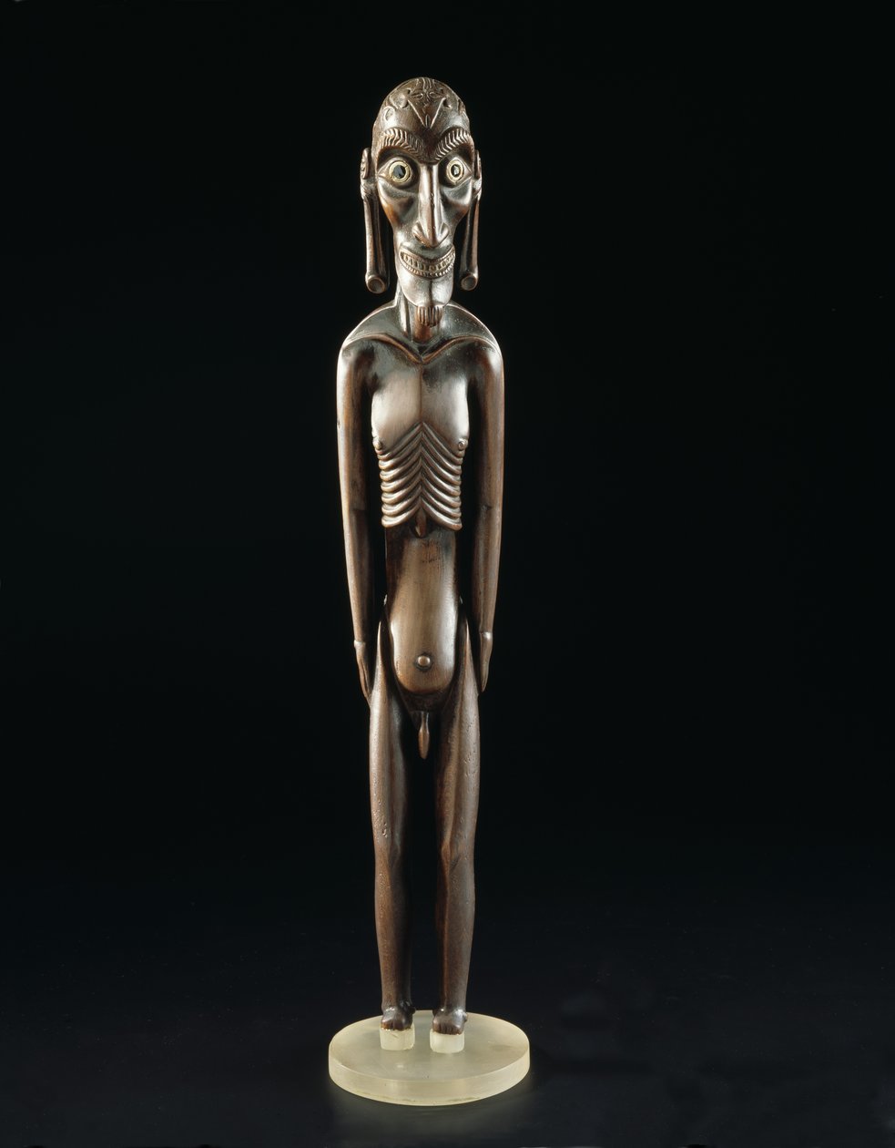 Figura di legno scolpita a forma di uomo, dall