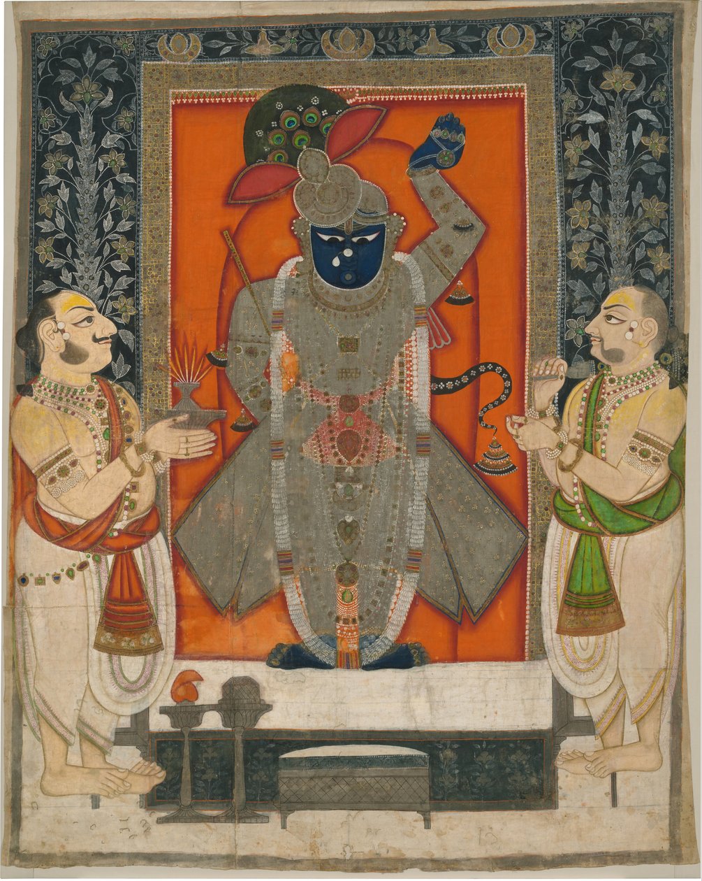 Sacerdoti che adorano Krishna come Shrinathji per il festival della Montagna di Cibo [Annakuta utsava]; arazzo del santuario [pichhavai] da Rajasthan Kota school