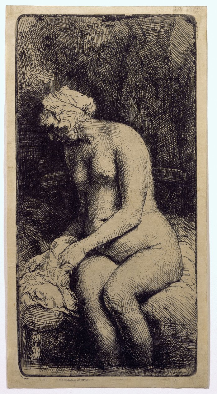 Una donna che si lava i piedi in un ruscello da Rembrandt van Rijn