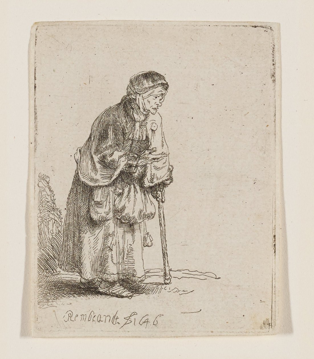 Mendicante appoggiata a un bastone da Rembrandt van Rijn