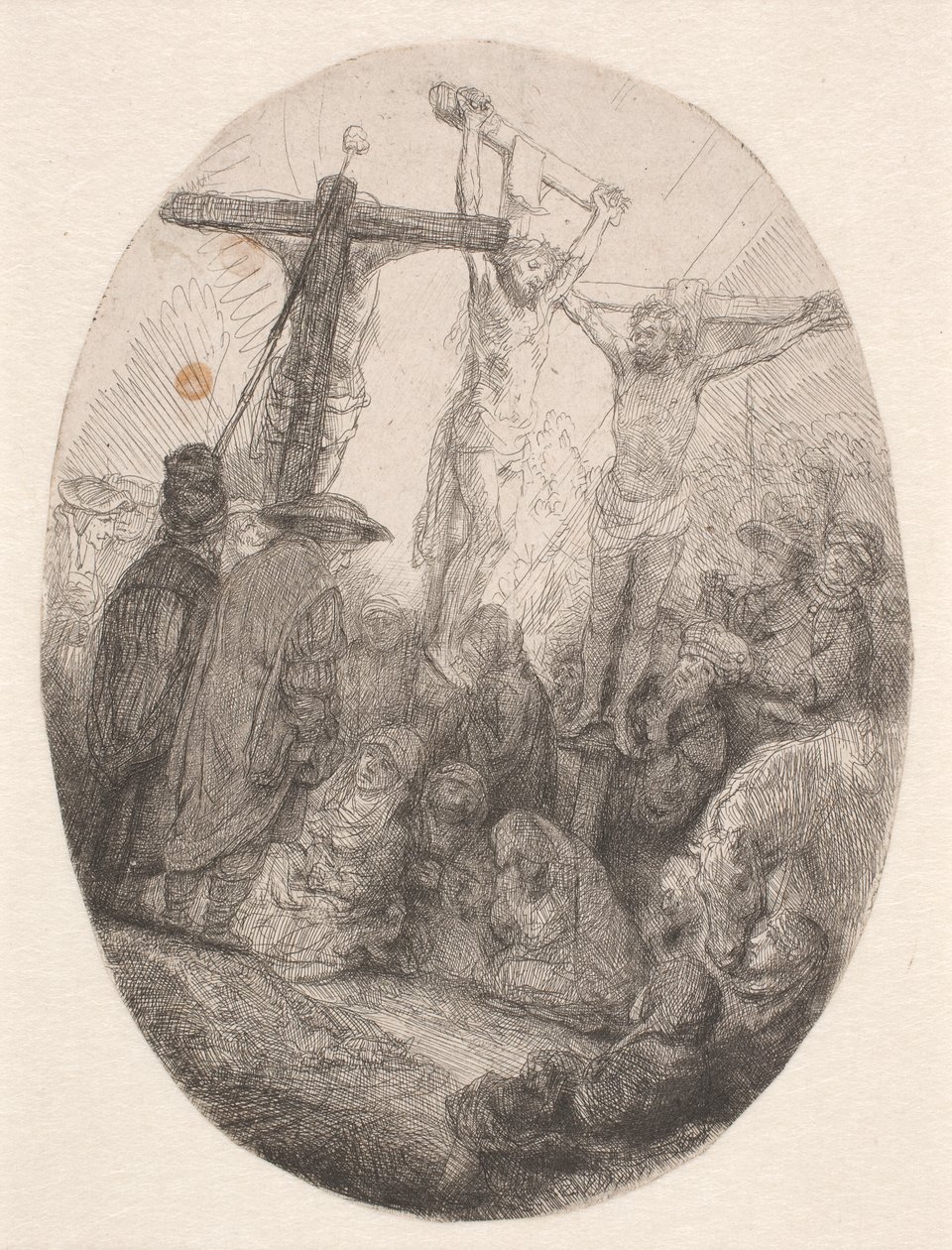 Cristo crocifisso tra i due ladroni: una targa ovale da Rembrandt van Rijn