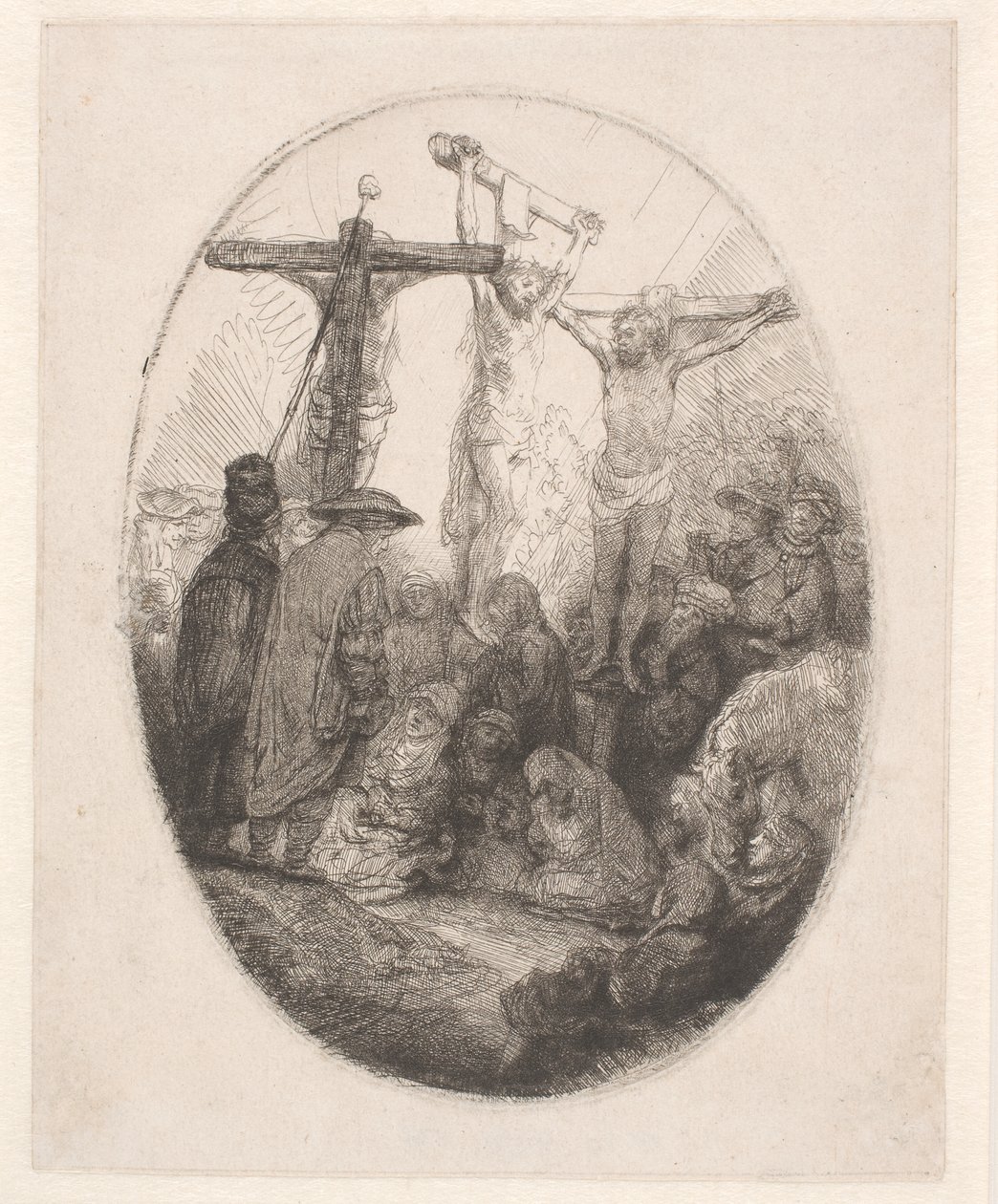 Cristo crocifisso tra i due ladroni: una targa ovale da Rembrandt van Rijn
