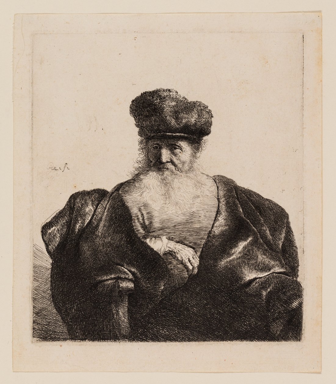 Vecchio con barba, berretto di pelliccia e mantello di velluto da Rembrandt van Rijn