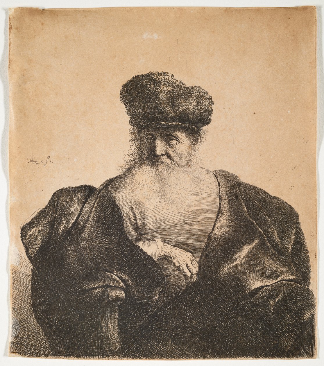 Vecchio con barba, berretto di pelliccia e mantello di velluto da Rembrandt van Rijn