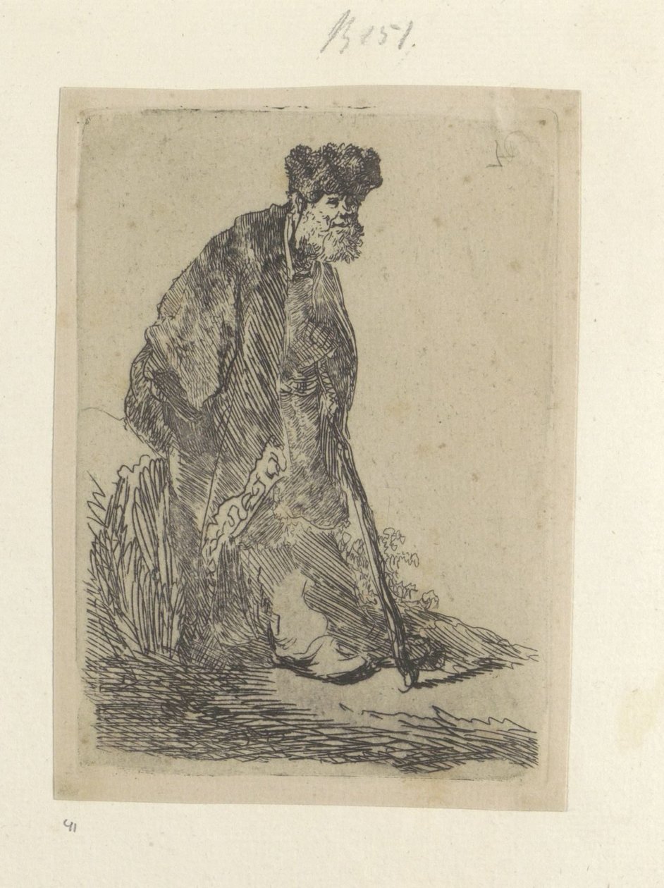 Uomo in piedi con un lungo mantello e cappello di pelliccia da Rembrandt van Rijn