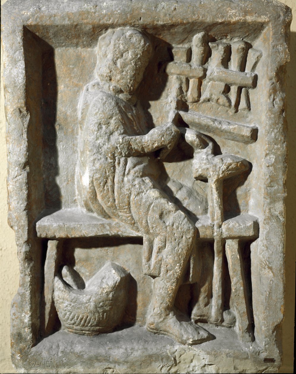 Arte romana: fabbro al lavoro. I secolo d.C. Roma, Museo della Civiltà Romana da Roman