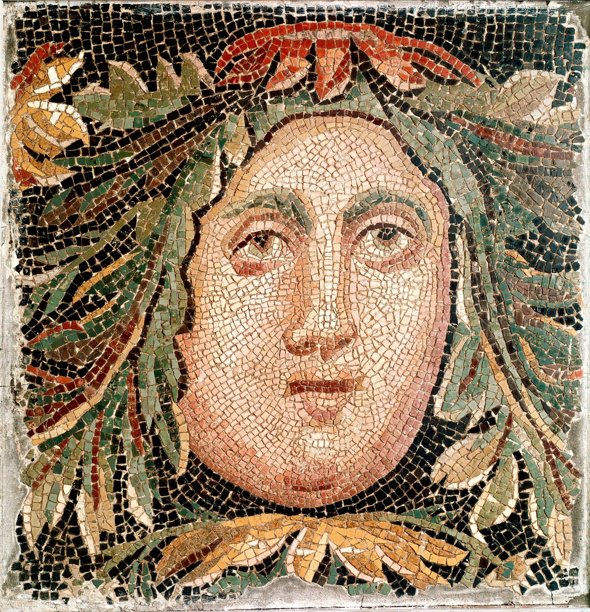 Arte romana: mosaico raffigurante la testa di una divinità marina. III secolo d.C. Roma, Museo Nazionale Romano da Roman