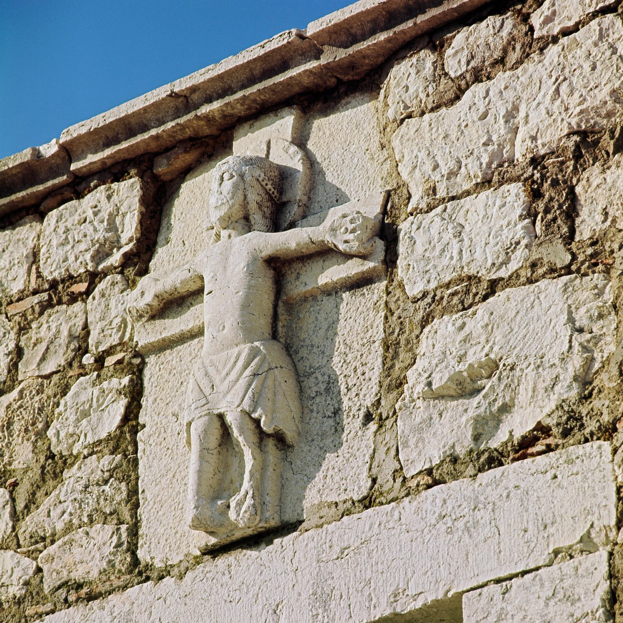 Cristo crocifisso Scultura in pietra del XIII secolo da Romanesque