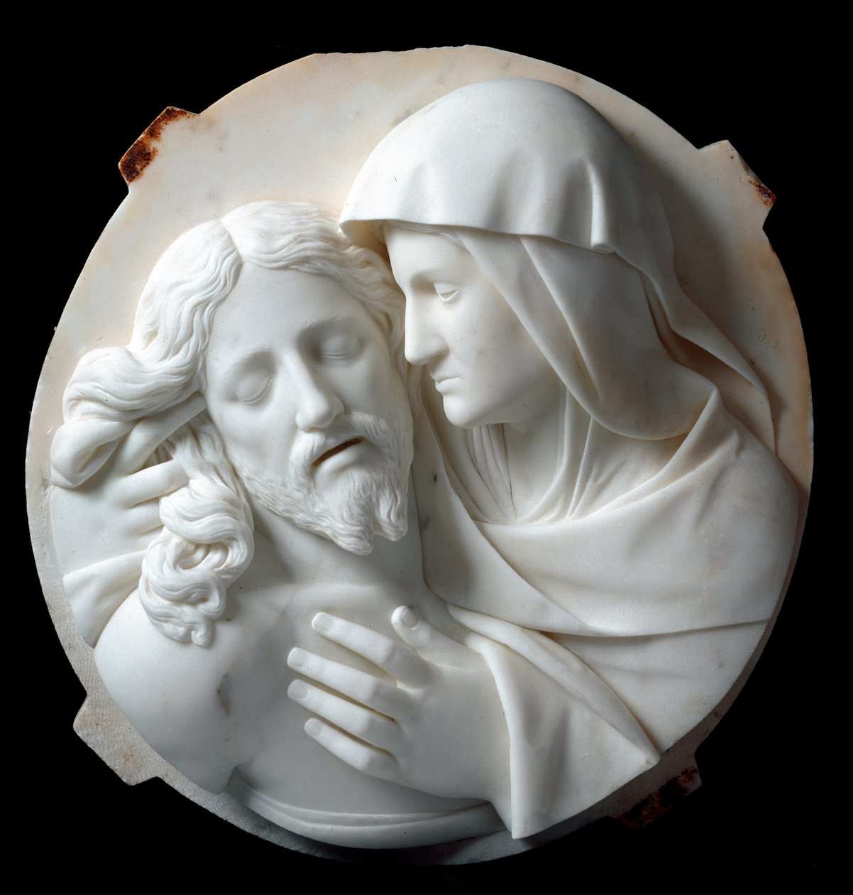 Pietà Scultura in marmo di Santo Varni (1807-1885) 1863-1870. Dim. 56x52x12 cm Dalla collezione del Principe Odon di Savoia. Genova, Galleria d