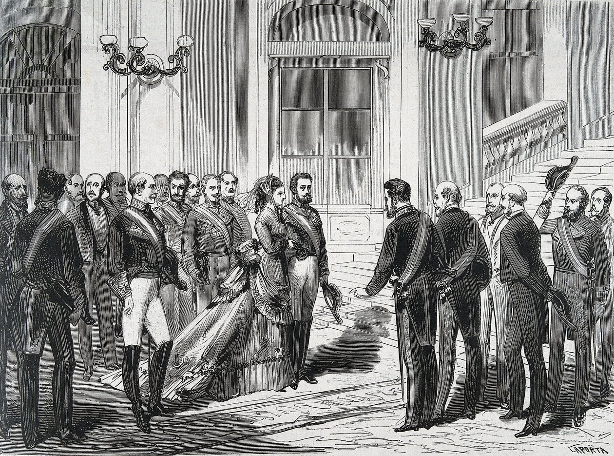 Il re di Spagna Amedeo I (Amedeo Ferdinando Maria di Savoia) (1845-1890) e sua moglie la regina Maria Vittoria dal Pozzo della Cisterna (1847-1876) al loro arrivo al Palazzo Reale di Madrid il 19/03/1871. Incisione da "La Ilustracion Espanola y America" da Spanish School