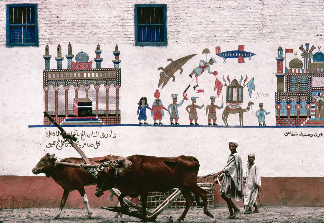 Murale dipinto su muro di stucco di una fattoria a Luxor commemora l