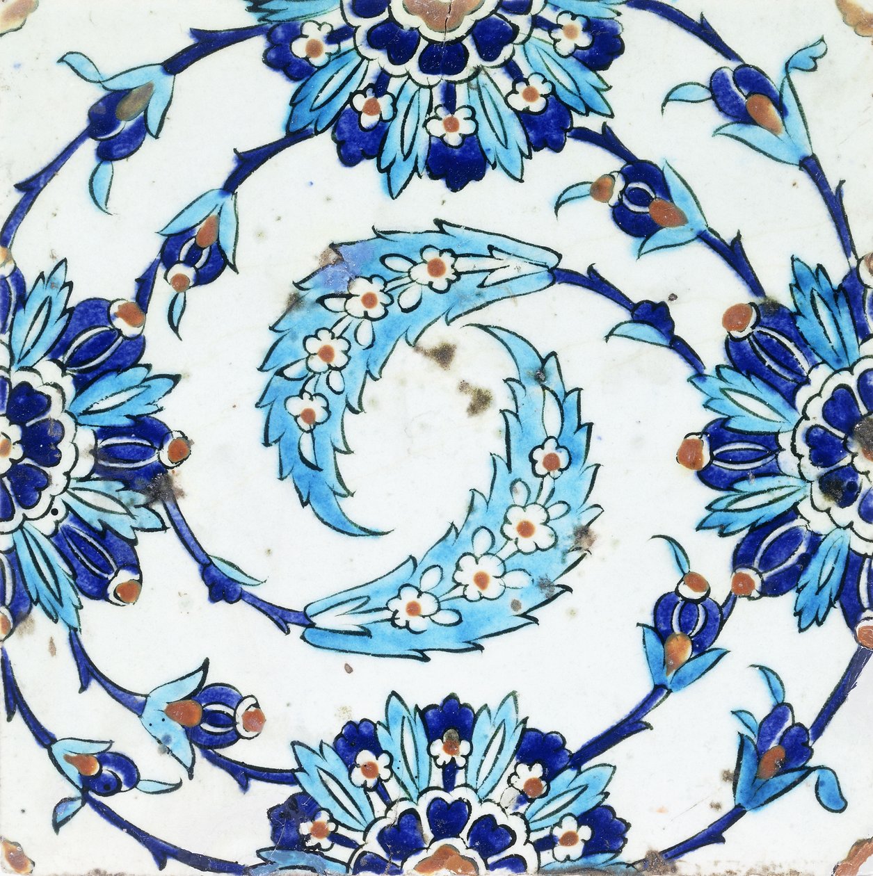 Piastrella di ceramica di Iznik, con un motivo floreale a spirale, inizio XVII secolo da Turkish School