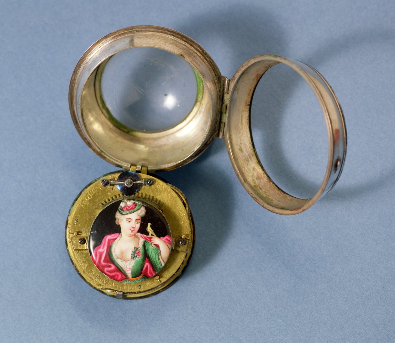 Orologio da tasca francese con staffa che porta un ritratto smaltato di una ragazza e un canarino, racchiuso in una custodia d