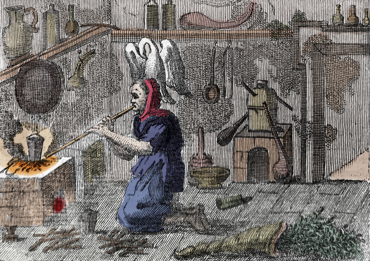 Una strega nel suo laboratorio che prepara una pozione magica. Incisione del XVI secolo da Unknown artist