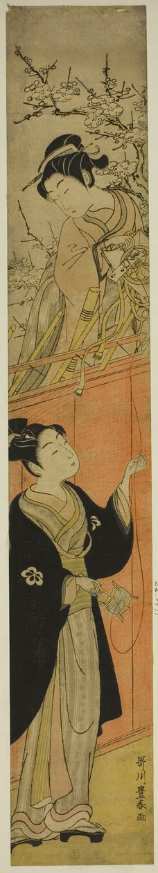 Giovane uomo e donna con un aquilone da Utagawa Toyoharu