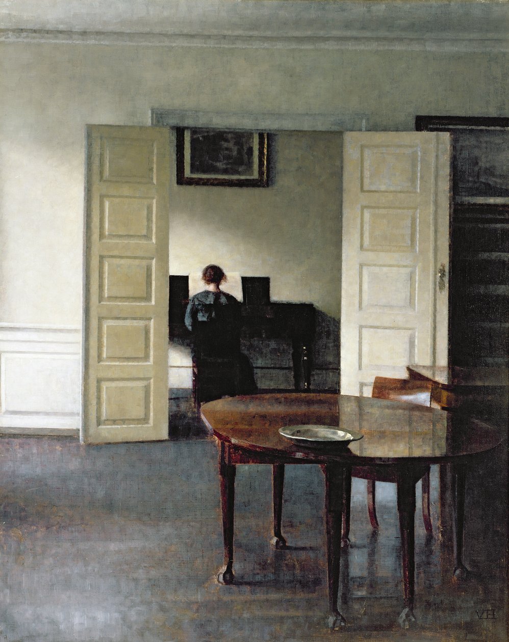 Interno con una donna che suona il piano, 1910 da Vilhelm Hammershoi