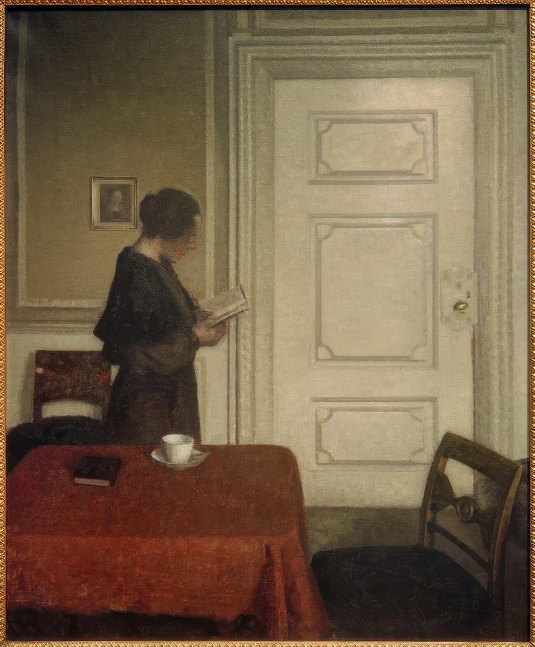 Donna che legge da Vilhelm Hammershoi