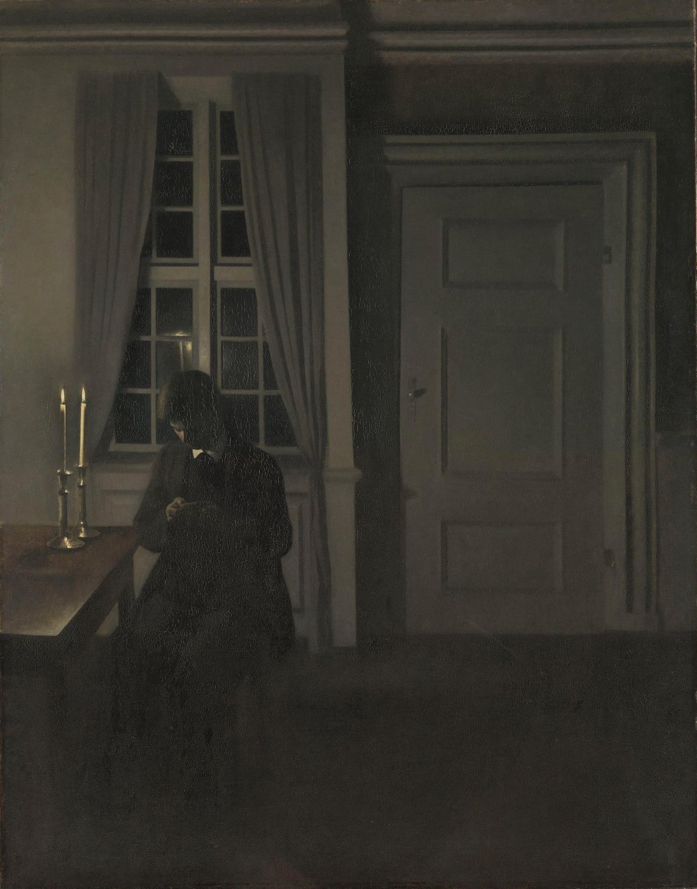 Il collezionista di monete, 1904 da Vilhelm Hammershoi