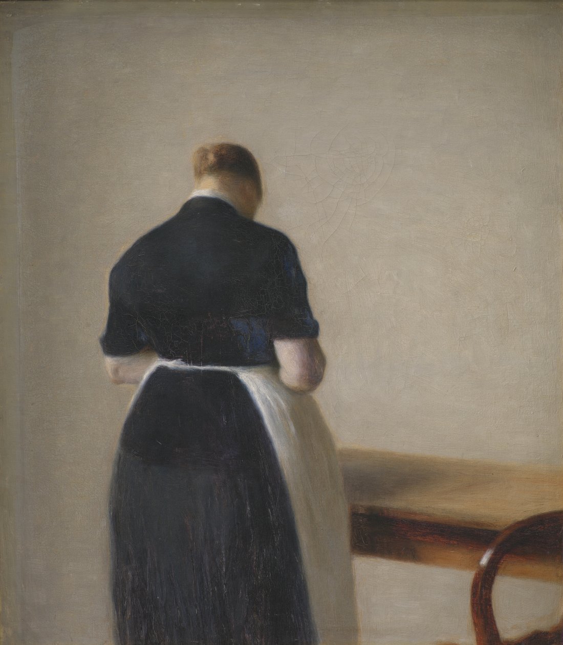 Donna vista di schiena da Vilhelm Hammershøi