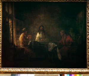 I pellegrini di Emmaus. Cristo appare ai pellegrini seduti a un tavolo in una locanda a Emmaus. Dipinto della bottega di Harmensz van Rijn detto Rembrandt (1606-1669)