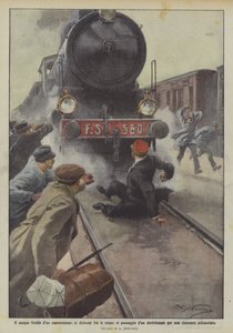 Capostazione si distende fra le rotaie al passaggio di un direttissimo