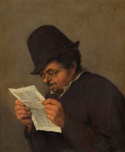 Vecchio contadino che legge un giornale