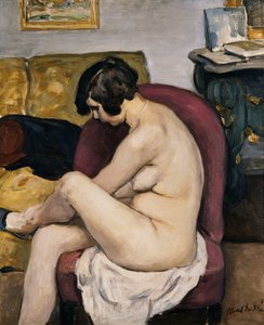 Nudo su una poltrona rossa