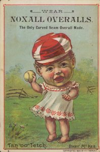 Bambino che tiene una palla da baseball da American School