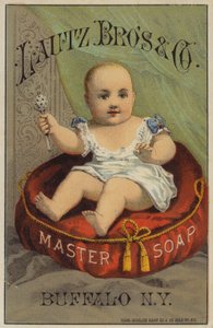Bambino che scuote un sonaglio da American School