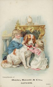 Bambini che giocano con un cane grande da American School