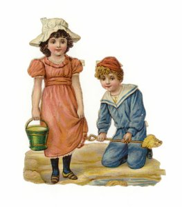 Ragazza e ragazzo che costruiscono castelli di sabbia da American School