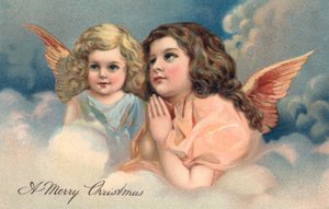 Due angeli di Natale in preghiera