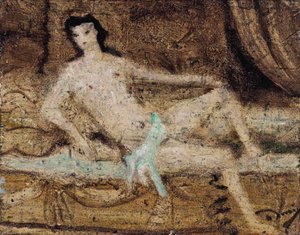 Nudo sdraiato su un divano