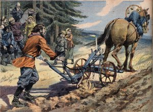 Un contadino russo ara il campo con l